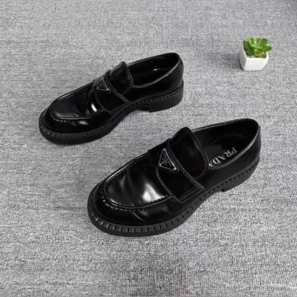Prada Shiny Black Leather Loafers - Picture 1 of 7
